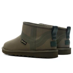 UGG X Reese Cooper Ultra Mini - Kalamata 7 UGG X Reese Cooper Ultra Mini - Kalamata -Ugg Shop UGG x Reese Cooper Ultra Mini Kalamata 1174071 KMT 04 01 25 Feature VR 4